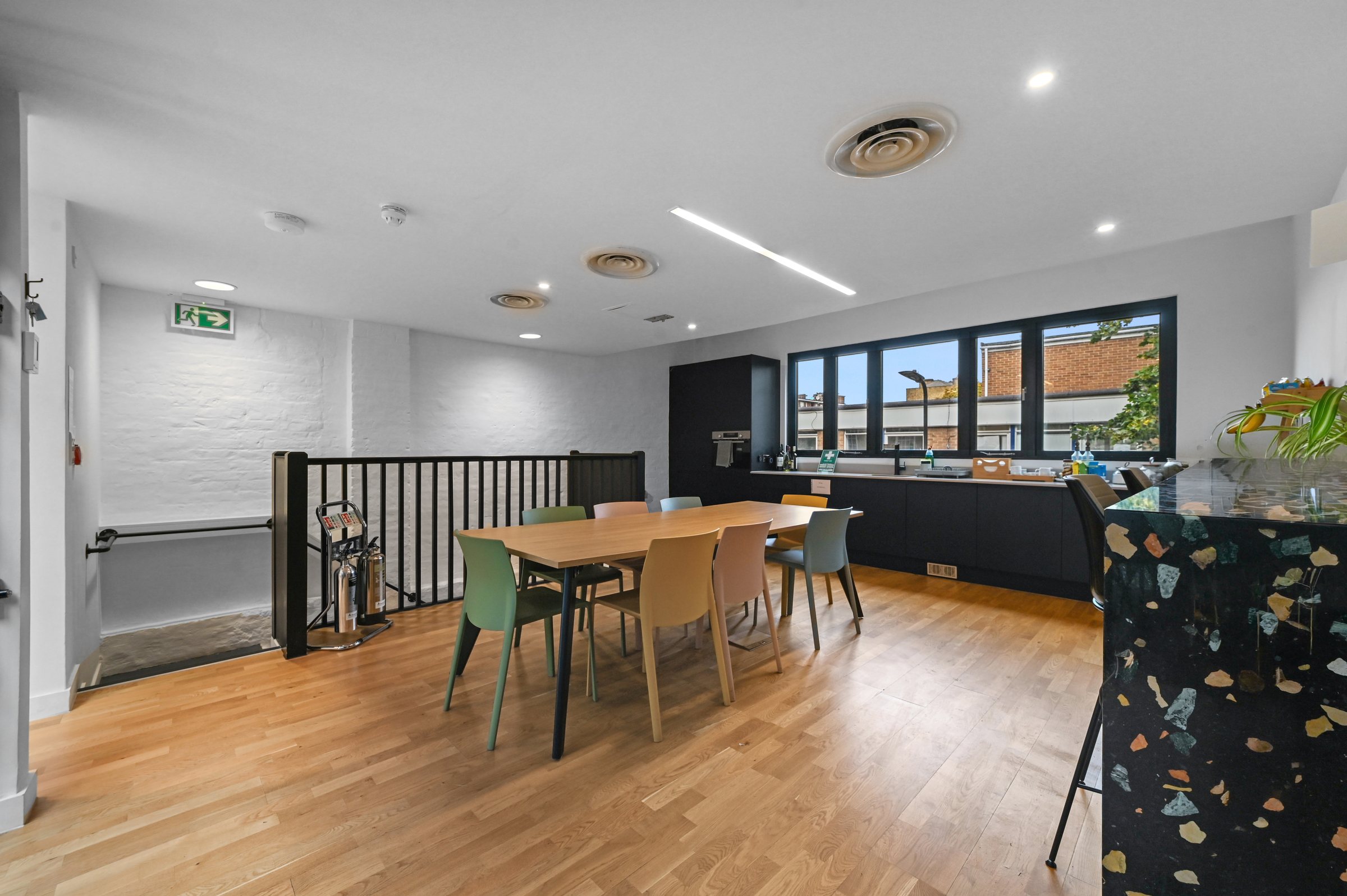 First-floor fitted kitchen and breakout table